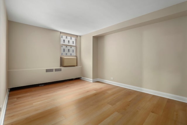 3950 N Lake Shore Dr Unit 720D, Chicago, IL 60613 - spare room featuring light wood-style flooring, baseboards, and visible vents