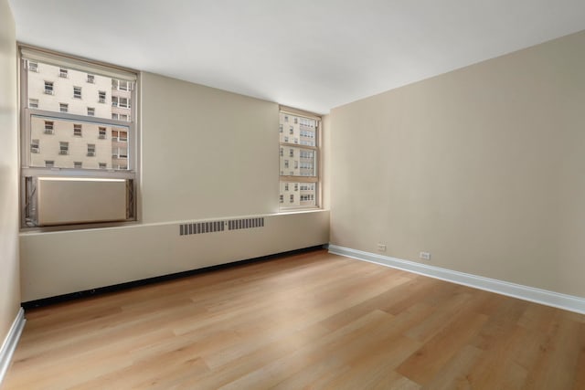 3950 N Lake Shore Dr Unit 720D, Chicago, IL 60613 - unfurnished room featuring baseboards and wood finished floors
