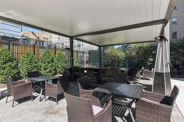 3950 N Lake Shore Dr Unit 720D, Chicago, IL 60613 - view of patio / terrace featuring outdoor dining area and fence