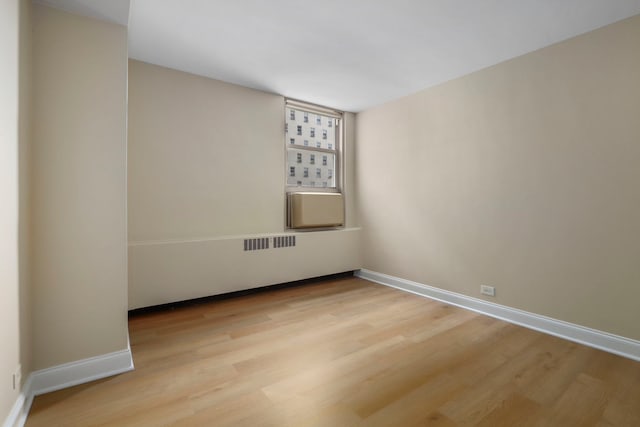 3950 N Lake Shore Dr Unit 720D, Chicago, IL 60613 - spare room featuring baseboards, visible vents, and light wood-type flooring