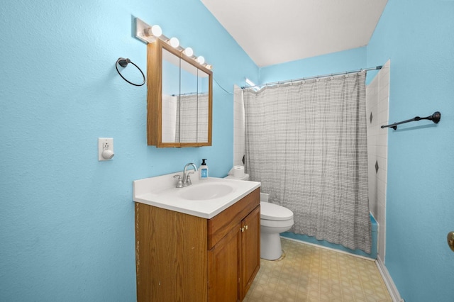 927 Lakeview Dr, Rochelle, IL 61068 - full bathroom featuring vanity, toilet, tile patterned floors, and shower / tub combo