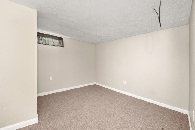 927 Lakeview Dr, Rochelle, IL 61068 - unfurnished room featuring carpet flooring, baseboards, and a textured ceiling