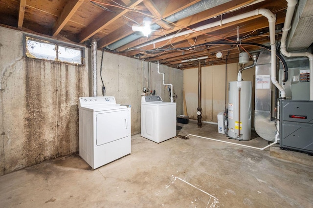 927 Lakeview Dr, Rochelle, IL 61068 - below grade area featuring water heater, washing machine and dryer, and heating unit