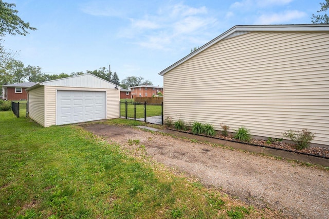 927 Lakeview Dr, Rochelle, IL 61068 - detached garage featuring asphalt driveway