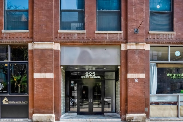 225 W Huron St Unit 507, Chicago, IL 60654 - view of exterior entry with brick siding