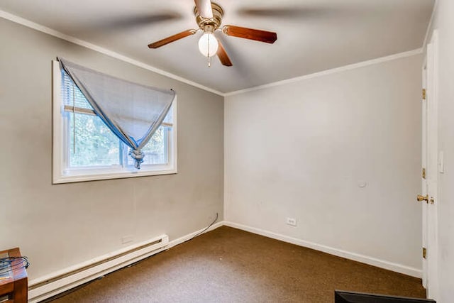 spare room featuring ornamental molding, a ceiling fan, baseboard heating, baseboards, and dark carpet