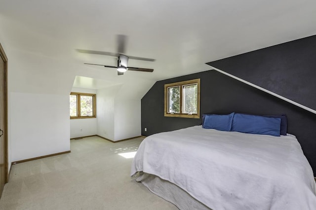 3128 Frans Ct, Winthrop Harbor, IL 60096 - bedroom with multiple windows, carpet flooring, vaulted ceiling, baseboards, and a ceiling fan