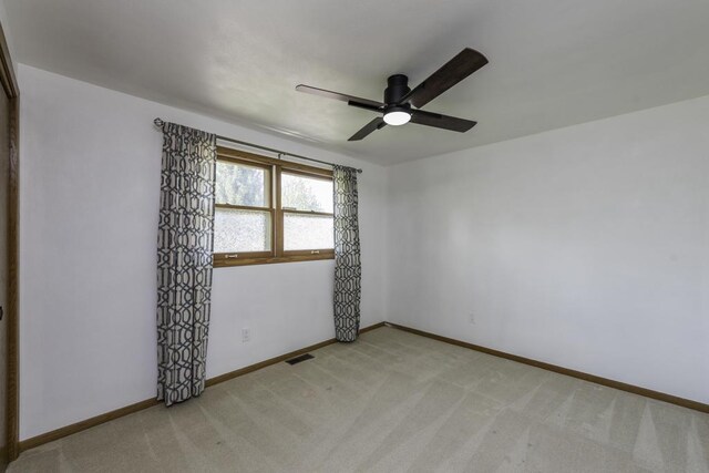 3128 Frans Ct, Winthrop Harbor, IL 60096 - empty room with carpet, baseboards, and ceiling fan