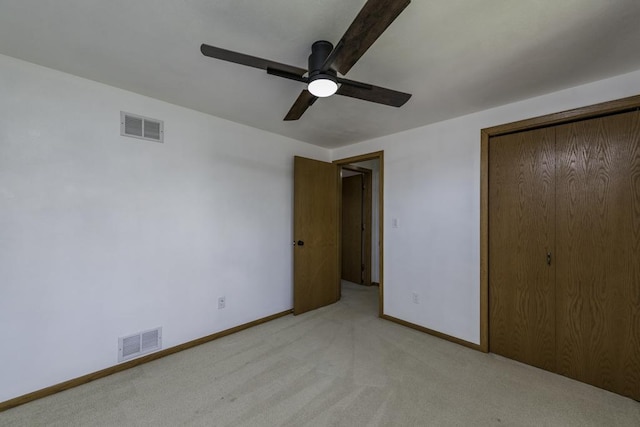3128 Frans Ct, Winthrop Harbor, IL 60096 - unfurnished bedroom with light colored carpet, baseboards, a closet, and a ceiling fan
