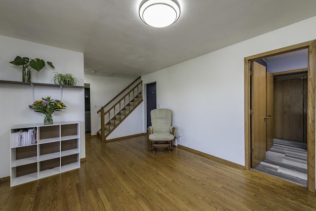 3128 Frans Ct, Winthrop Harbor, IL 60096 - unfurnished room featuring stairs, wood finished floors, and baseboards