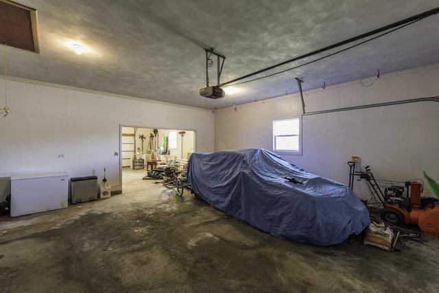 3128 Frans Ct, Winthrop Harbor, IL 60096 - garage featuring refrigerator and a garage door opener