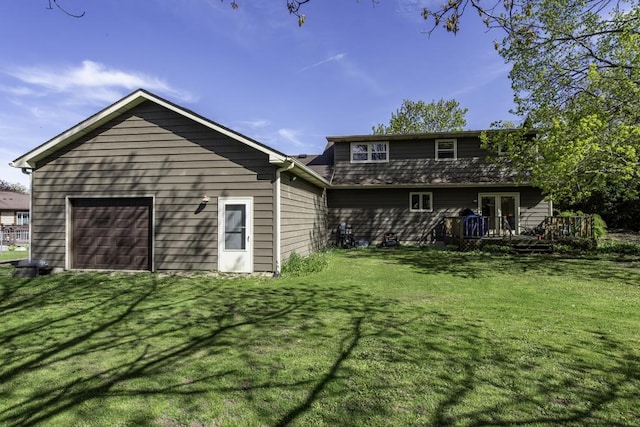 3128 Frans Ct, Winthrop Harbor, IL 60096 - back of house with a deck, a lawn, french doors, and a garage