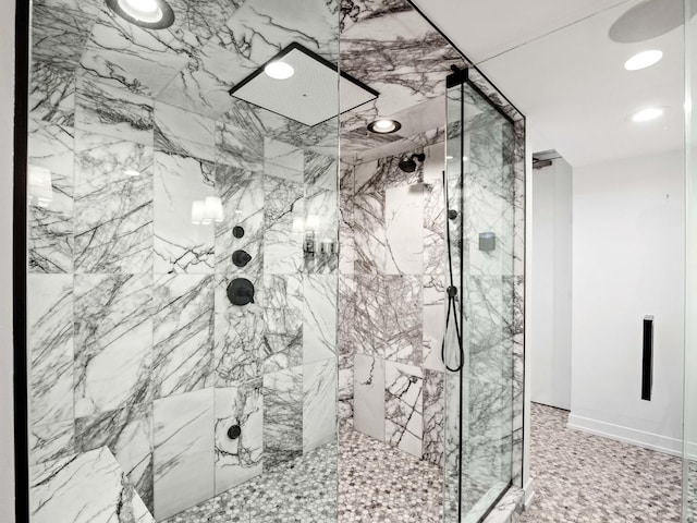 full bathroom with a marble finish shower