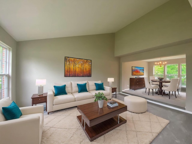 living area featuring baseboards, a notable chandelier, high vaulted ceiling, and plenty of natural light