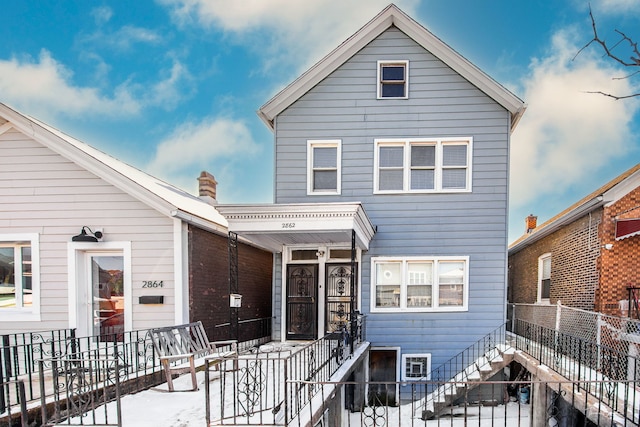 2862 S Keeley St, Chicago, IL 60608 - snow covered property with fence private yard and stairs