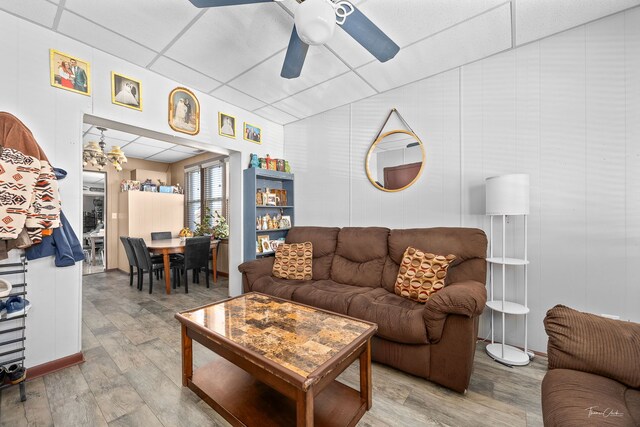 2862 S Keeley St, Chicago, IL 60608 - living room with ceiling fan with notable chandelier and wood finished floors