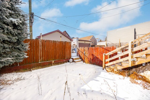 2862 S Keeley St, Chicago, IL 60608 - yard layered in snow featuring fence