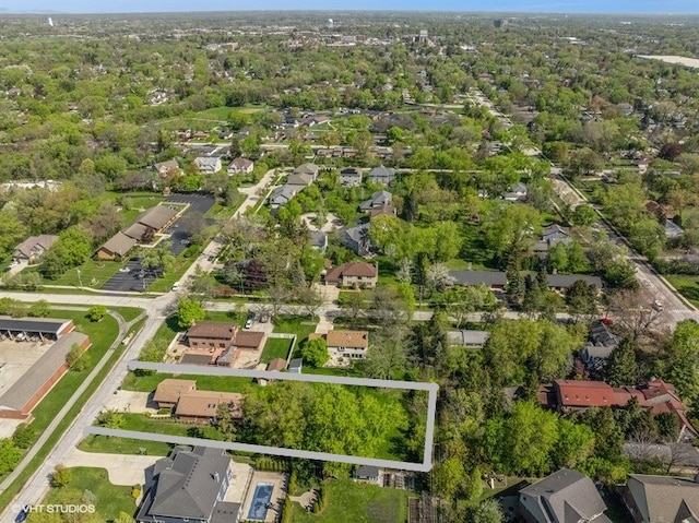 aerial overview of property's location featuring nearby suburban area