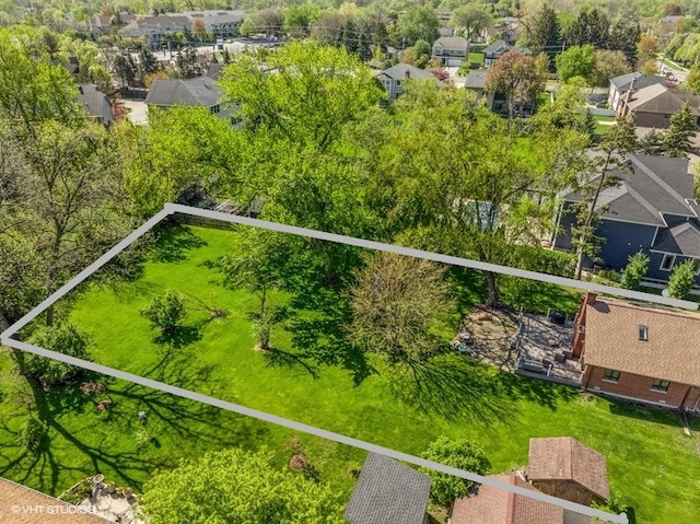 aerial perspective of suburban area with property parcel outlined