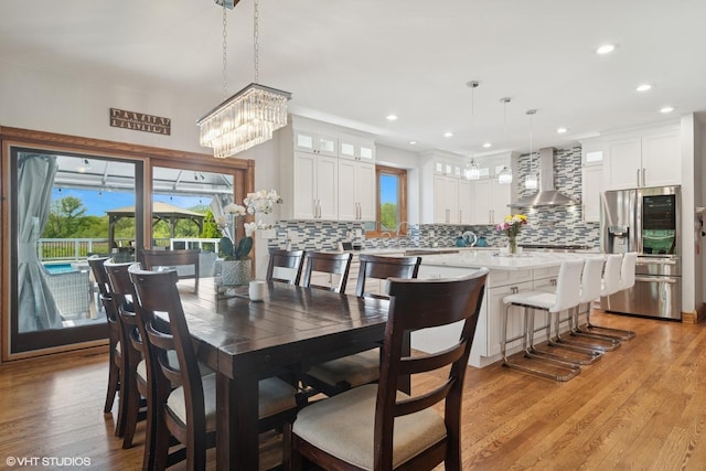 26464 N Bittersweet Trl, Mundelein, IL 60060 - dining room with plenty of natural light, light wood-style flooring, recessed lighting, and a chandelier