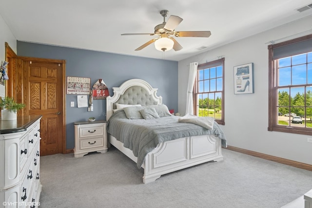 26464 N Bittersweet Trl, Mundelein, IL 60060 - bedroom with light carpet, a ceiling fan, and baseboards