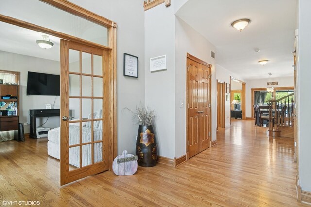 26464 N Bittersweet Trl, Mundelein, IL 60060 - hallway featuring light wood-style flooring and baseboards