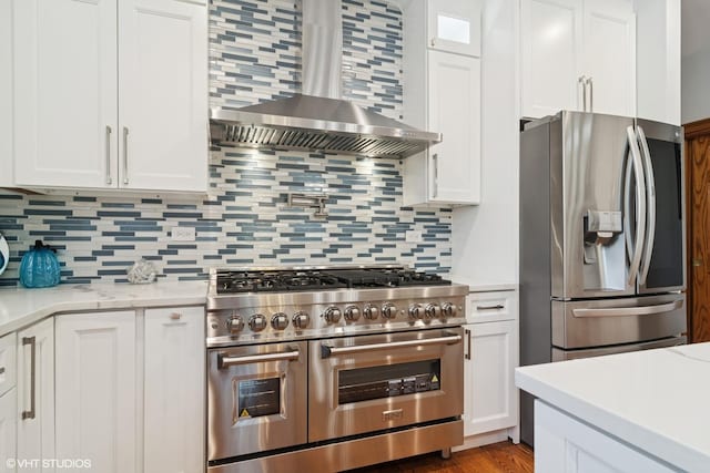 26464 N Bittersweet Trl, Mundelein, IL 60060 - kitchen with appliances with stainless steel finishes, wall chimney range hood, and tasteful backsplash