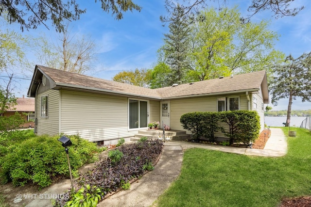 3714 W Lake Shore Dr, Wonder Lake, IL 60097 - view of front of house with a front lawn and roof with shingles