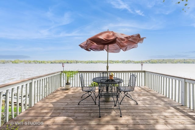 3714 W Lake Shore Dr, Wonder Lake, IL 60097 - wooden deck with a water view and outdoor dining space
