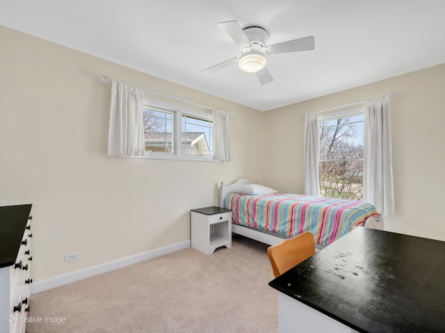 504 S Pierce Ave, Wheaton, IL 60187 - carpeted bedroom with multiple windows and a ceiling fan