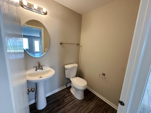 6604 Pasture Side Trl, Matteson, IL 60443 - bathroom with toilet, wood finished floors, baseboards, and a sink