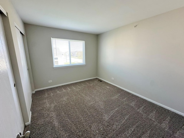6604 Pasture Side Trl, Matteson, IL 60443 - unfurnished bedroom featuring carpet, a closet, and baseboards