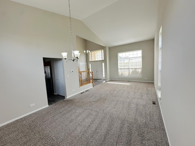 6604 Pasture Side Trl, Matteson, IL 60443 - interior space featuring high vaulted ceiling, visible vents, an inviting chandelier, carpet flooring, and baseboards