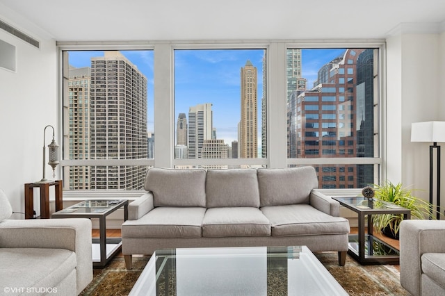 living area featuring expansive windows and a view of city