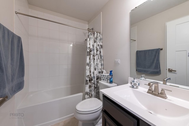 bathroom with shower / tub combo with curtain, vanity, and toilet