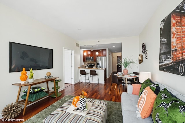 living room with wood finished floors