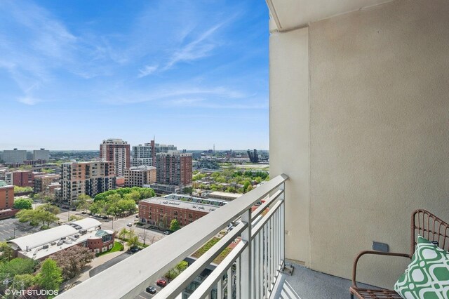 balcony featuring a city view