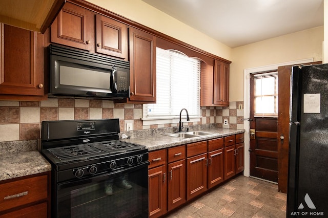 10041 S Calumet Ave, Chicago, IL 60628 - kitchen featuring black appliances, a sink, tasteful backsplash, and brown cabinetry