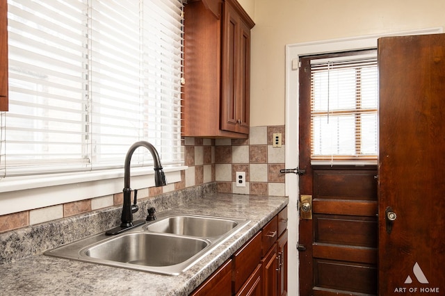 10041 S Calumet Ave, Chicago, IL 60628 - kitchen with a sink and brown cabinets