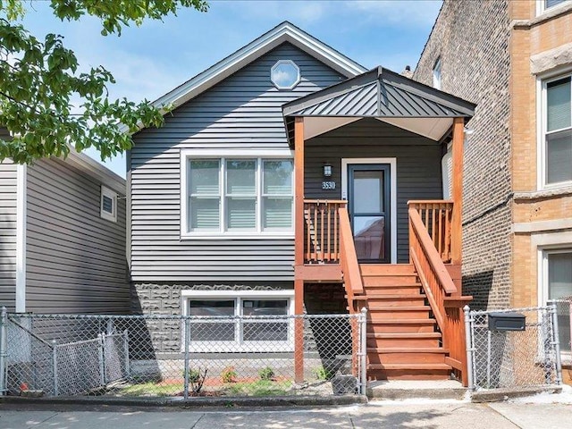 3530 S Union Ave, Chicago, IL 60609 - view of front facade featuring stairs and fence private yard