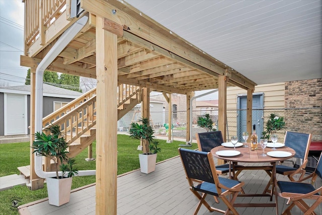 3530 S Union Ave, Chicago, IL 60609 - deck featuring a lawn, stairs, outdoor dining space, and fence