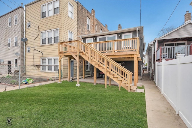 3530 S Union Ave, Chicago, IL 60609 - back of house with a yard, stairway, a wooden deck, and a fenced backyard