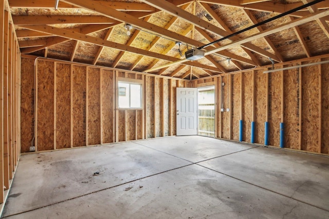 misc room with a garage