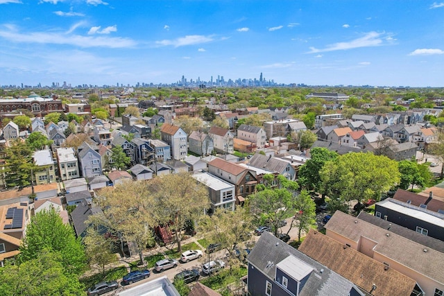 aerial perspective of suburban area featuring a view of skyline