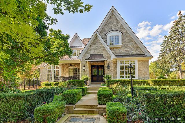 305 S Wright St, Naperville, IL 60540 - view of front facade featuring a porch, a standing seam roof, french doors, and stone siding