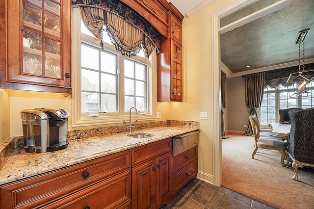 305 S Wright St, Naperville, IL 60540 - kitchen featuring glass insert cabinets, ornamental molding, and a sink
