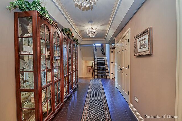 305 S Wright St, Naperville, IL 60540 - corridor featuring a notable chandelier, baseboards, ornamental molding, wood-type flooring, and a raised ceiling
