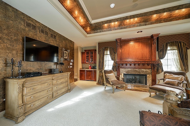 305 S Wright St, Naperville, IL 60540 - sitting room with light carpet, a fireplace, a raised ceiling, and ornamental molding