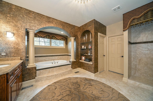 305 S Wright St, Naperville, IL 60540 - bathroom featuring walk in shower, decorative columns, vanity, visible vents, and a bath
