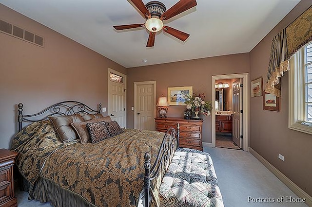 305 S Wright St, Naperville, IL 60540 - carpeted bedroom featuring multiple windows, ensuite bathroom, visible vents, and baseboards